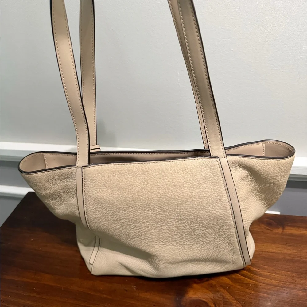 Beige medium sized Michael Kors handbag